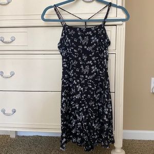 Garage black romper with light purple flowers